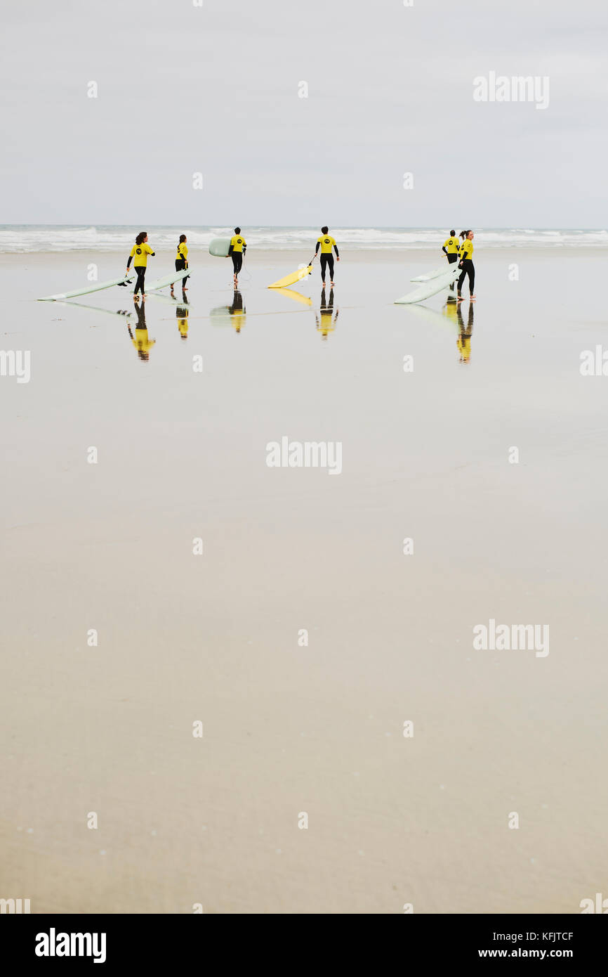 Surf school at the Plage de la Torche Plomeur Finistere Brittany France Stock Photo