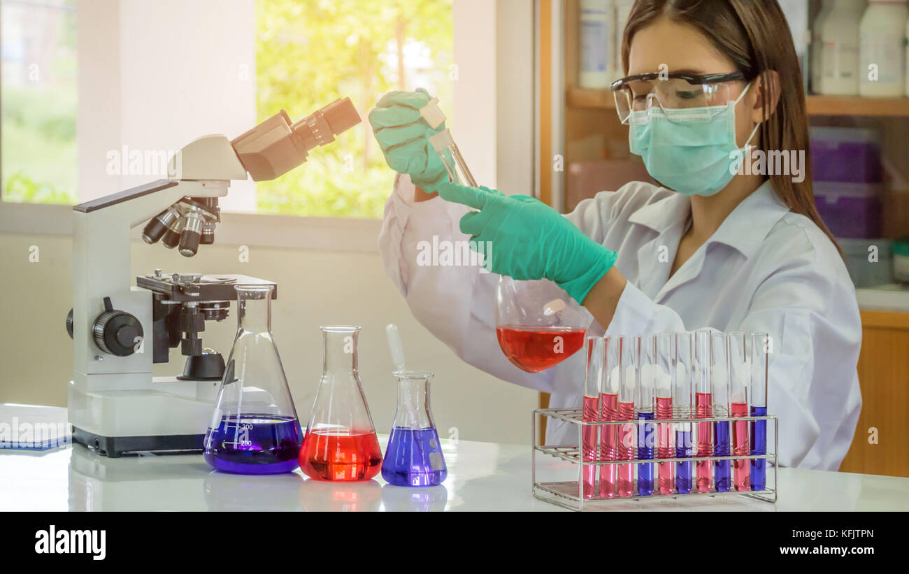 Asian female forensic scientist working hi-res stock photography and ...