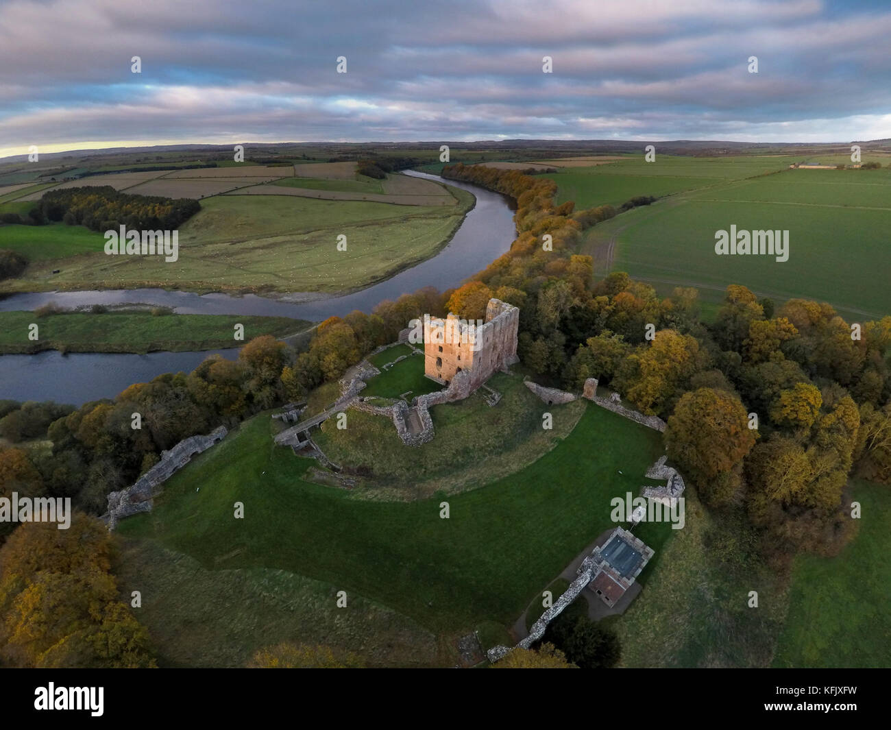 Aerial view of the Scottish Border with Norham Castle standing guard over the River Tweed Stock Photo
