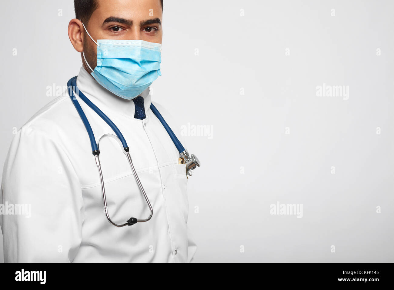 Male doctor posing at studio Stock Photo Alamy