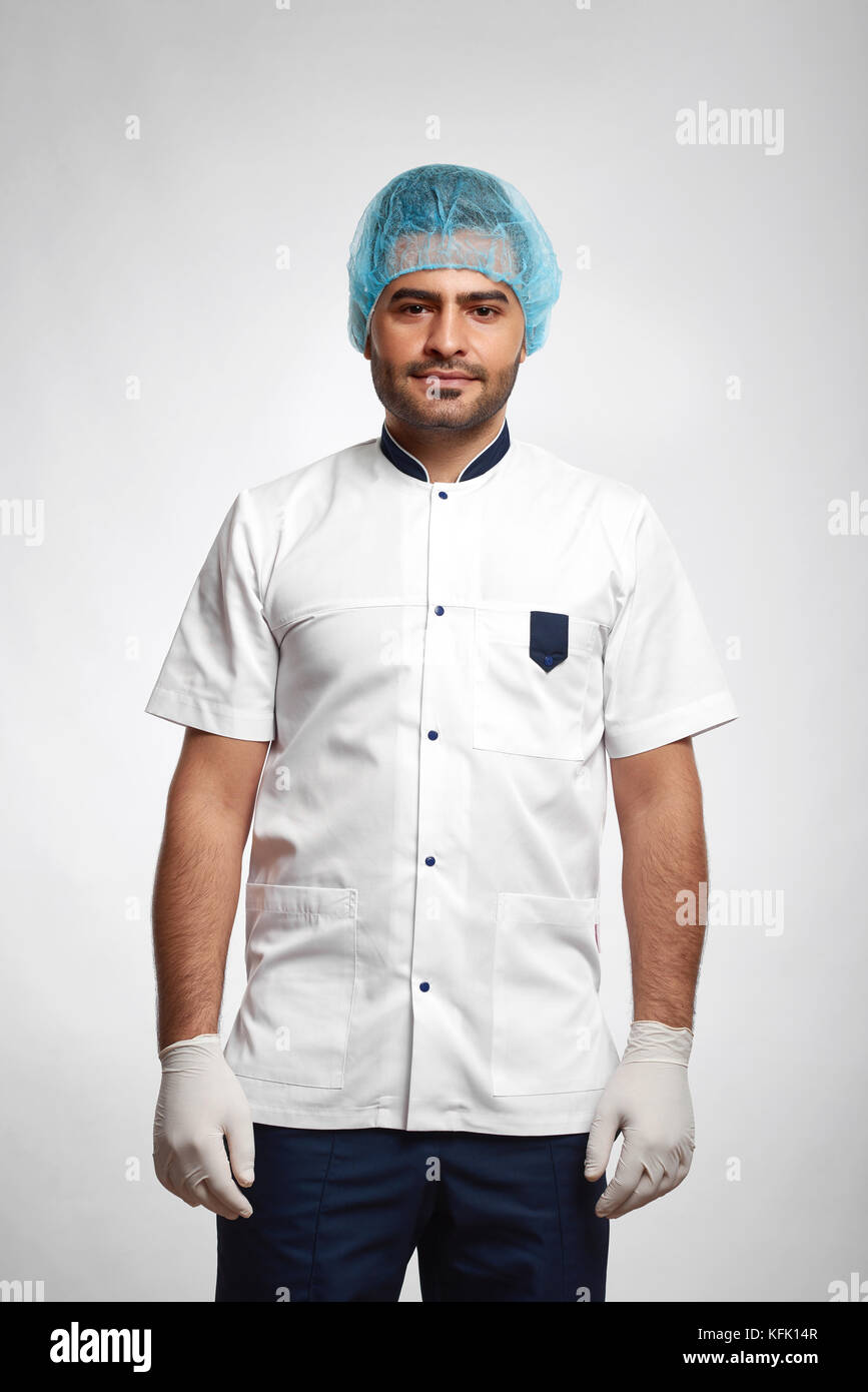 Male doctor posing at studio Stock Photo - Alamy
