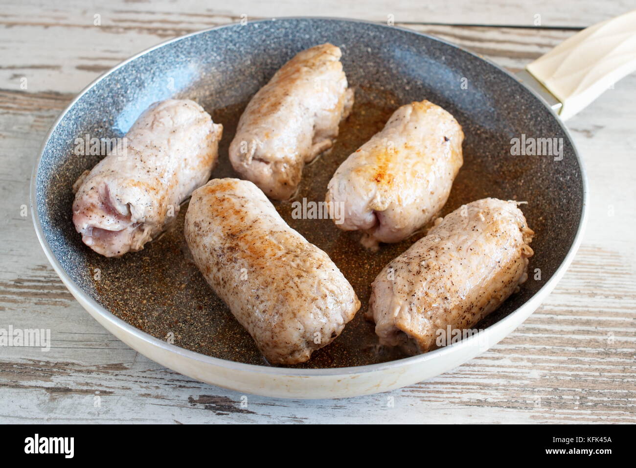 Meat rolls, mushroom and cheese filling.pan fried in olive oil Step by