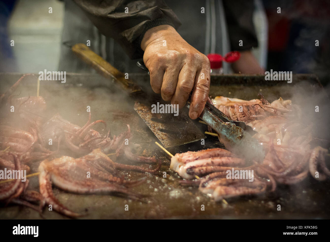 Frying octopus at the Pakuranga night market, Auckland, New Zealand Stock Photo