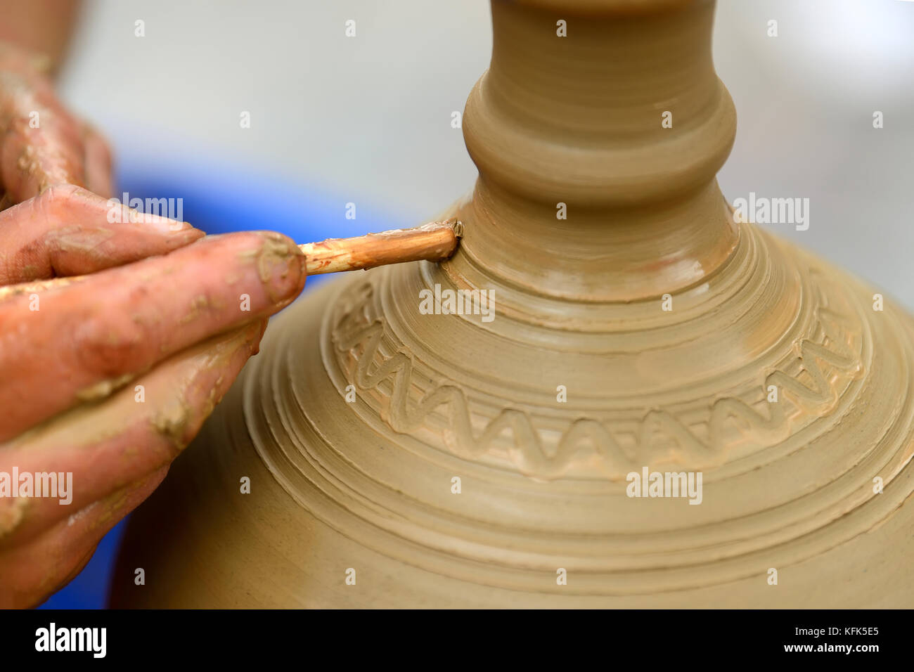 Hands of a potter. Potter making ceramic pot on the pottery wheel Stock  Photo - Alamy
