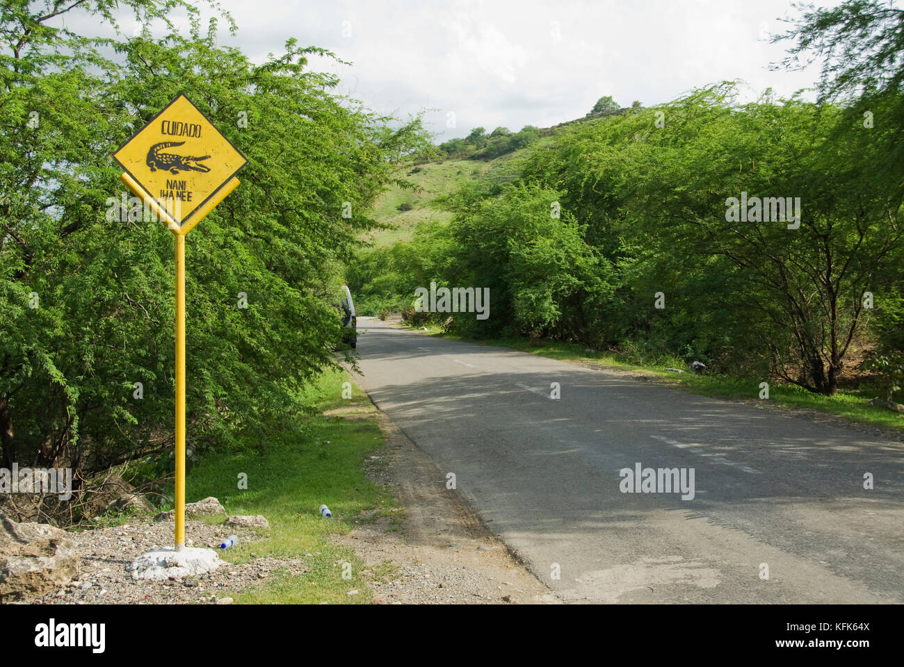 Crocodile crossing sign on the road from Dili to Baucau, Timor-Leste (East Timor). Saltwater crocodiles, Crocodylus porosus, are common in this area. Stock Photo
