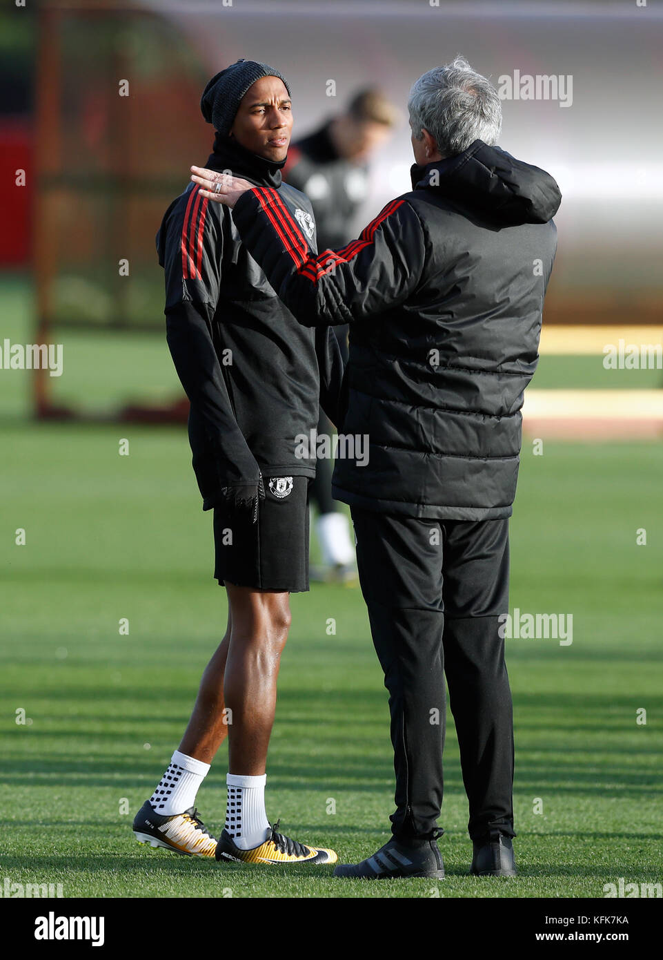 Manchester United Manager Jose Mourinho Speaks To Ashley Young During Stock Photo Alamy
