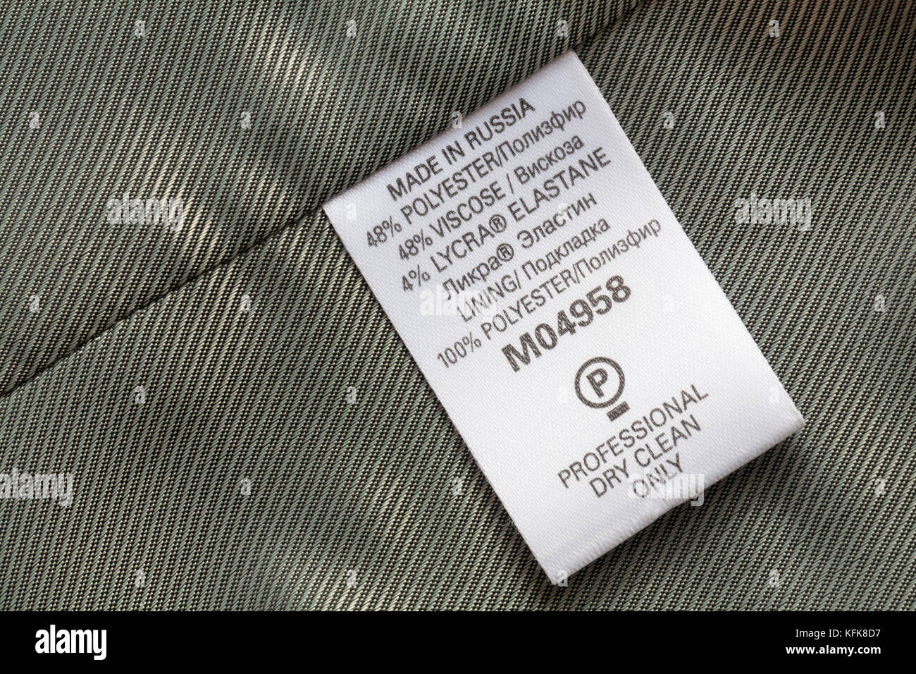 48% polyester 48% viscose 4% lycra, lining 100% polyester detail on label  in woman's jacket made in Russia - professional dry clean only Stock Photo  - Alamy