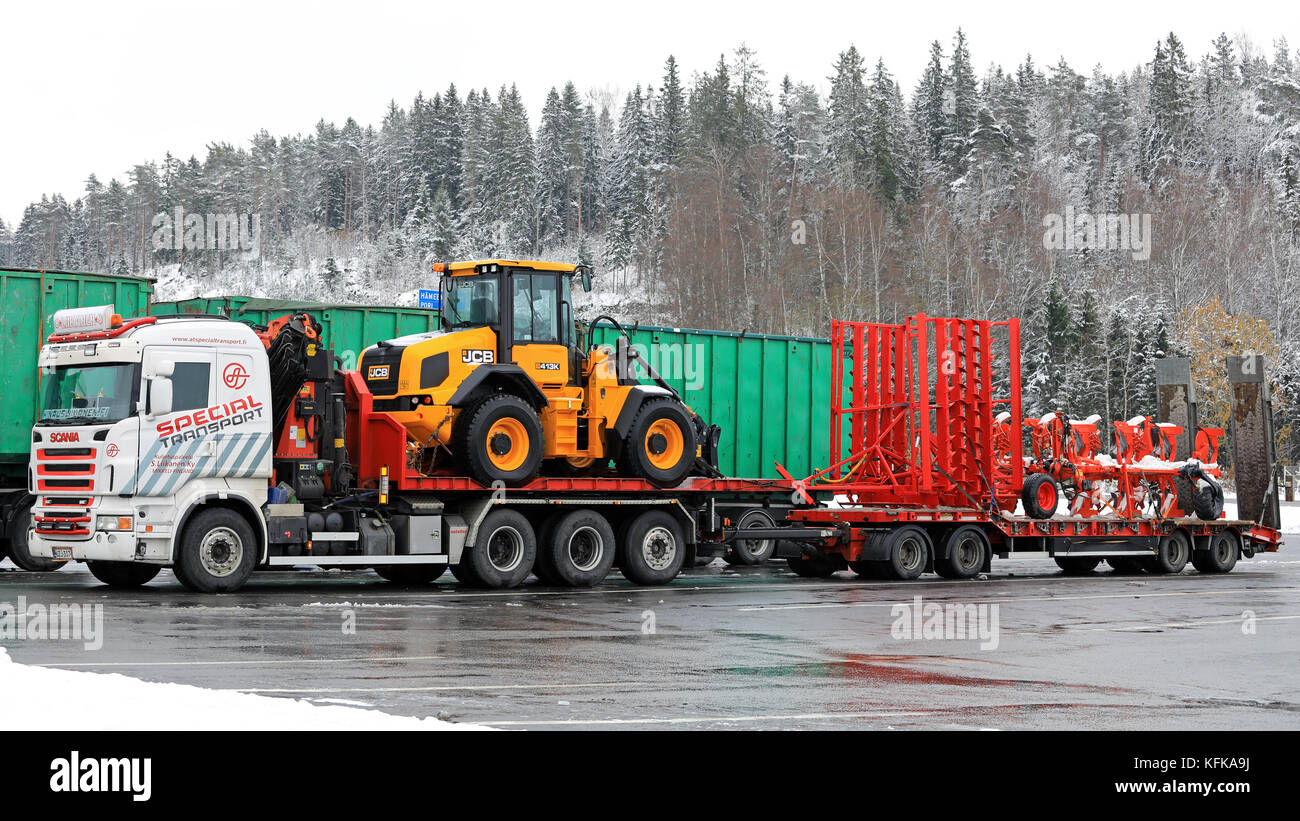 FORSSA, FINLAND - OCTOBER 27, 2017: Scania combination vehicle of S. Liikanen for Ahola Special Transport parked on a truck stop during the haul of a  Stock Photo