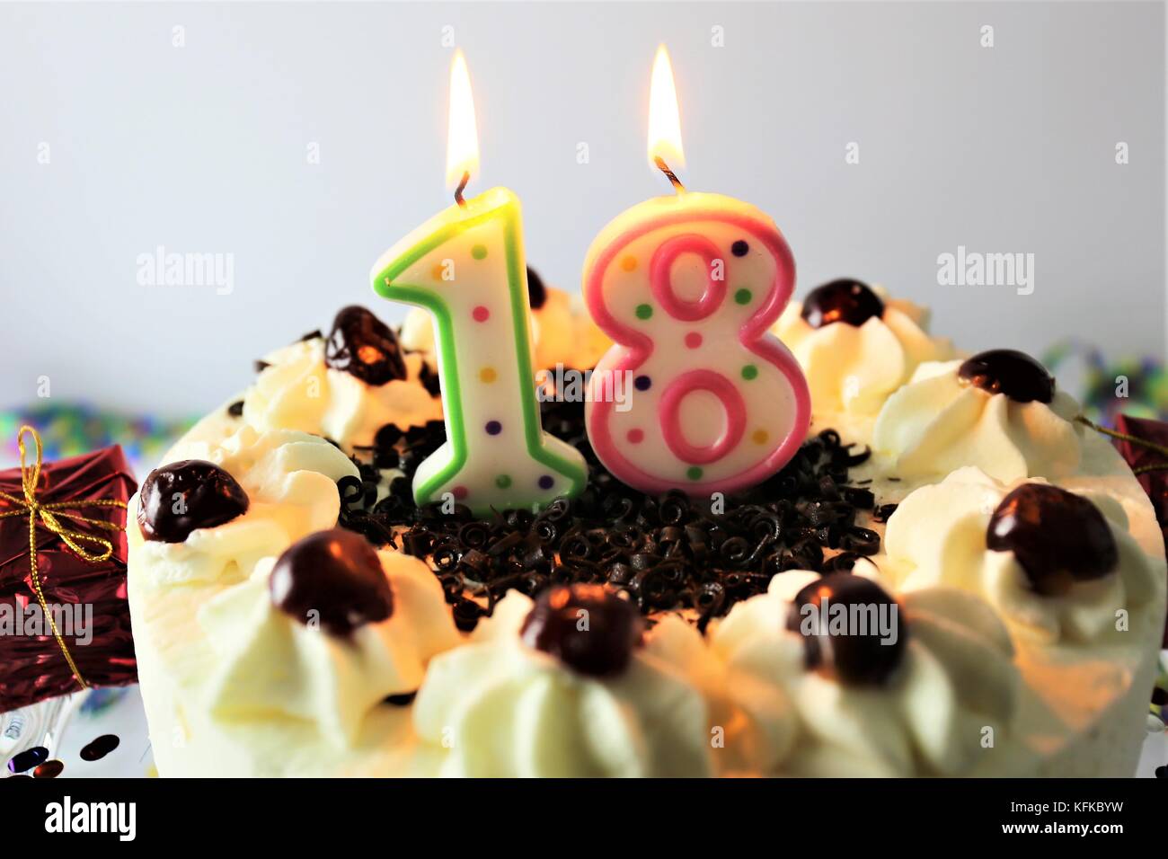 An Image of a birthday cake with candle 18 Stock Photo Alamy