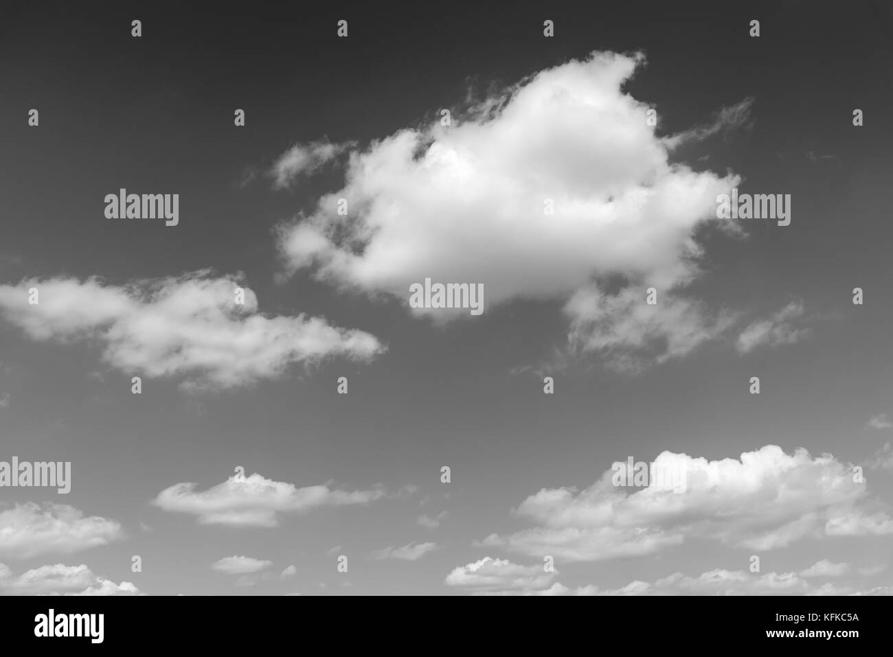 The vast blue sky and clouds sky. blue sky background with tiny clouds black and white Stock