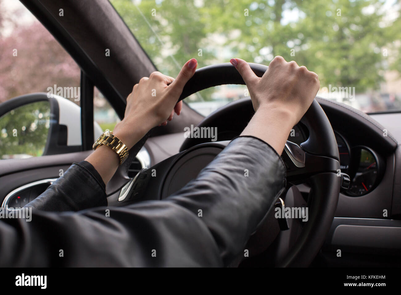 Female hands on the wheel close up Stock Photo Alamy