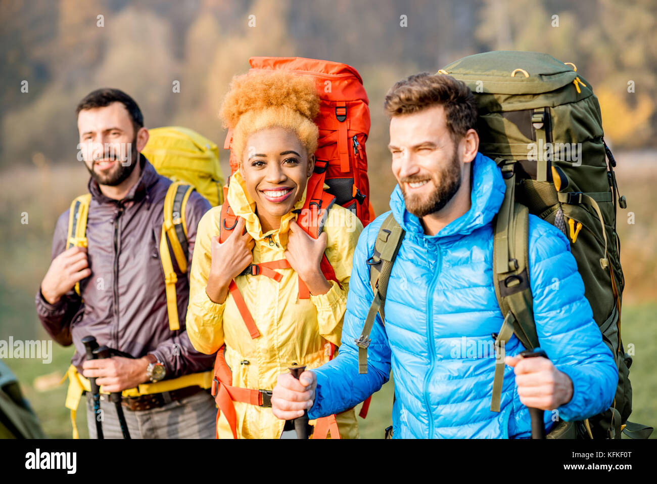 Hikers with backpacks outdoors Stock Photo - Alamy