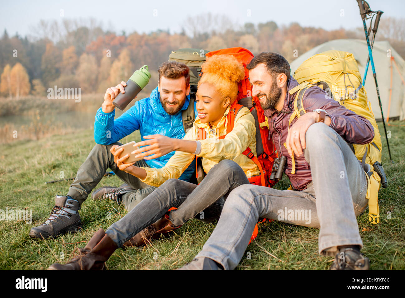 Hikers with backpacks outdoors Stock Photo - Alamy