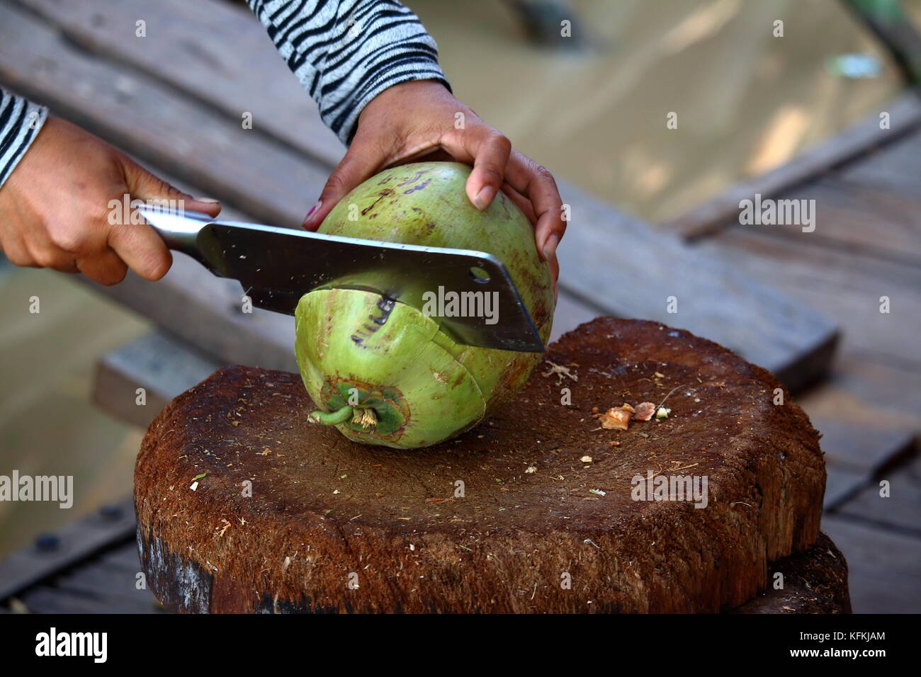 Coconut preparation cutting Stock Photo Alamy