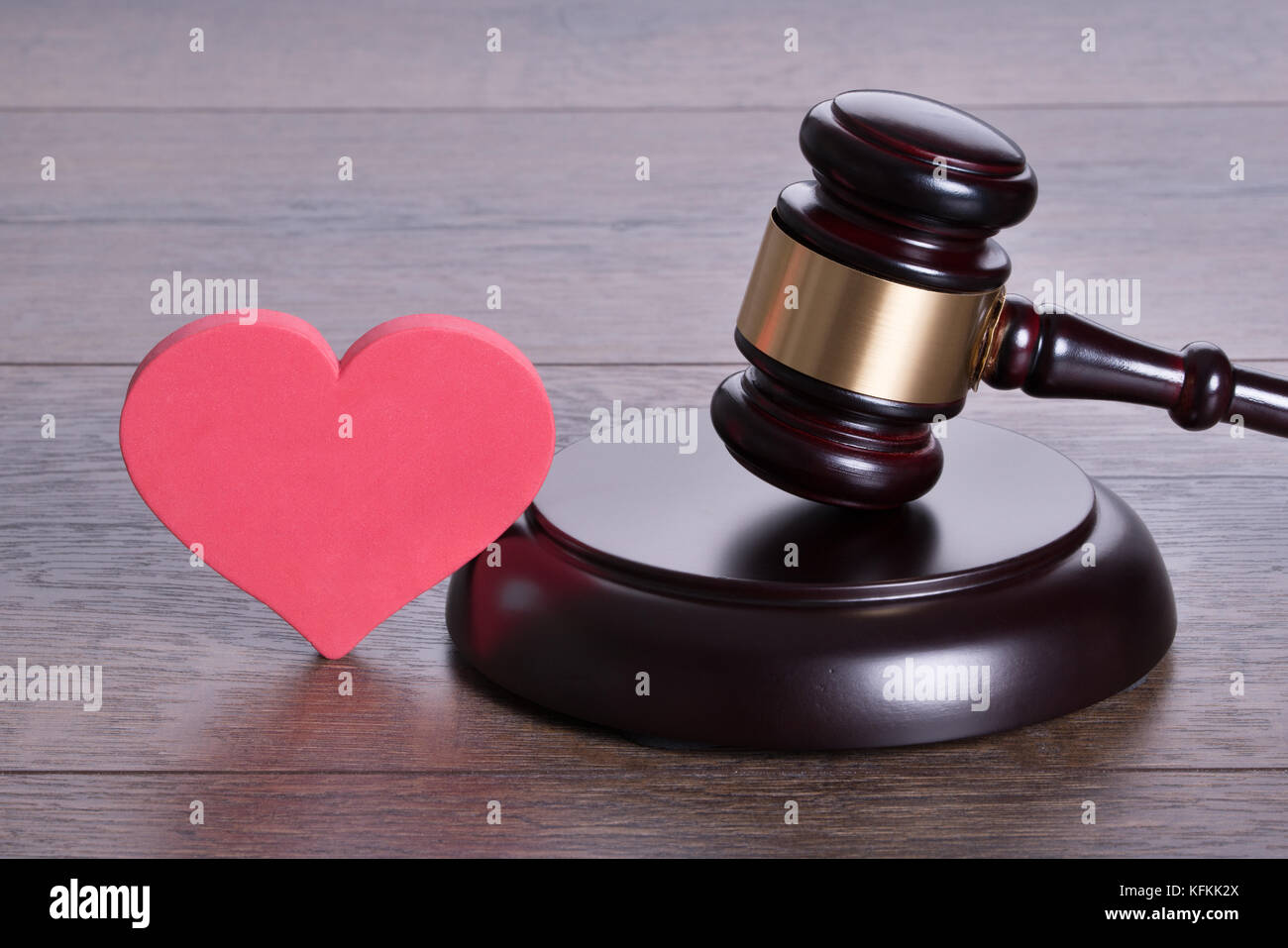 Judge gavel and heart shape in divorce concept Stock Photo