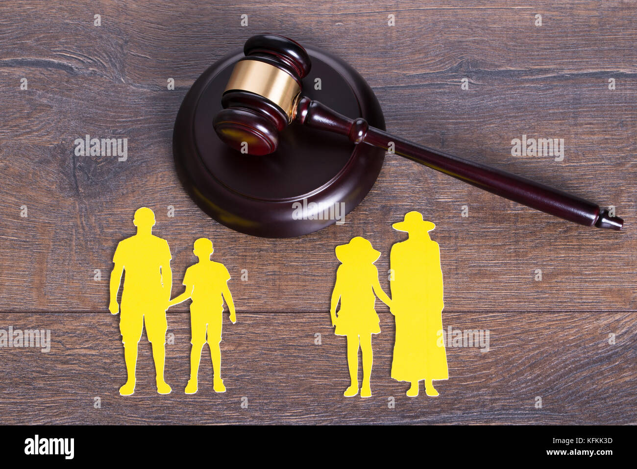 Gavel on the table and paper family representing divorce Stock Photo