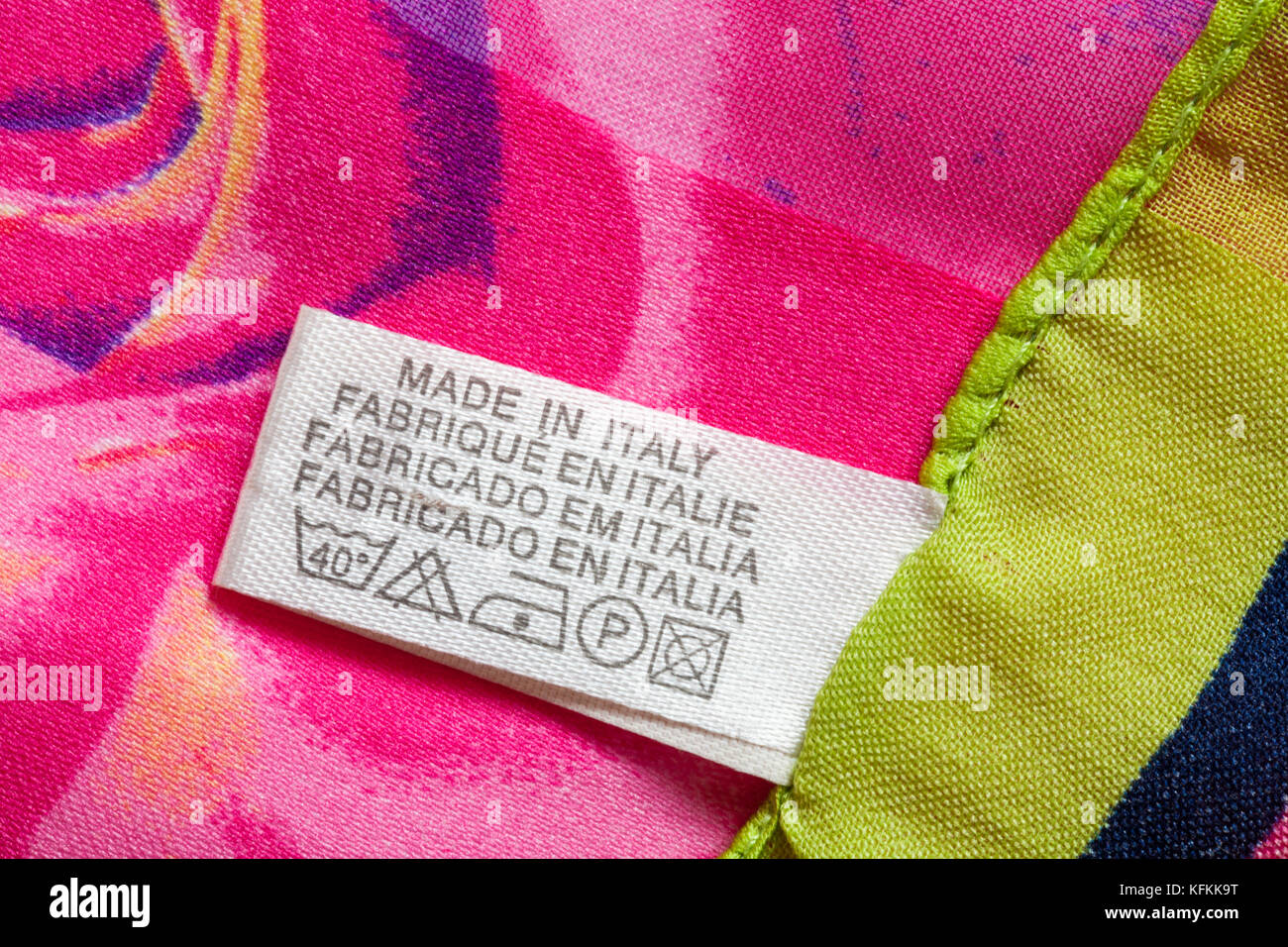 Label in woman's scarf made in Italy with care wash symbols - sold in the UK United Kingdom, Great Britain Stock Photo