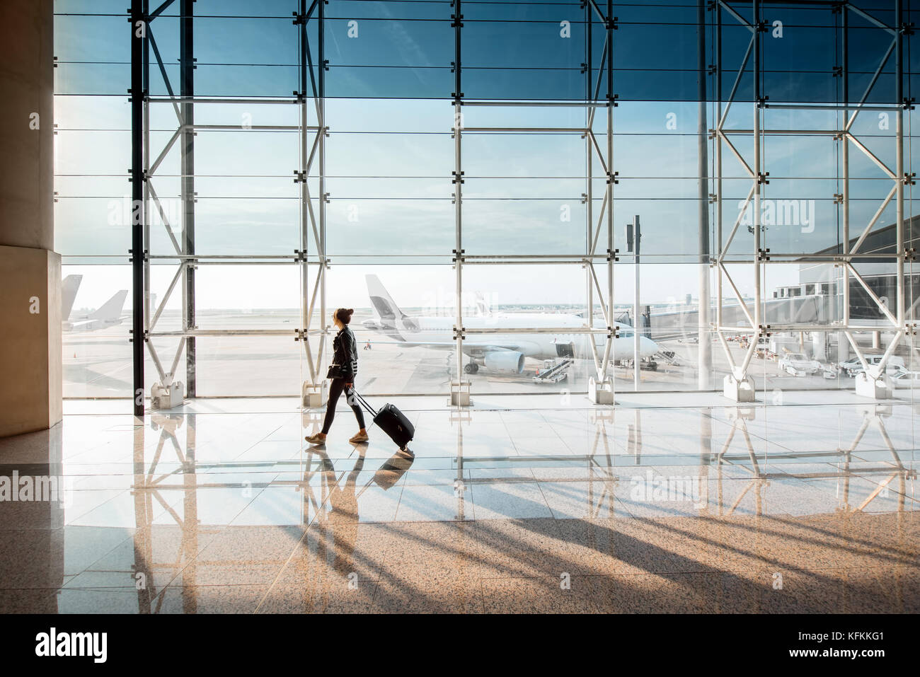 Woman at the airport Stock Photo - Alamy