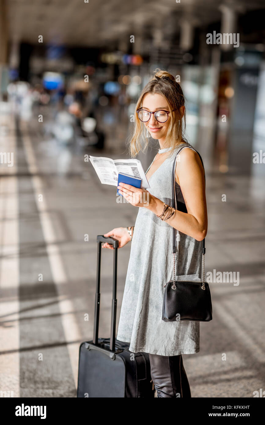 Woman at the airport Stock Photo - Alamy