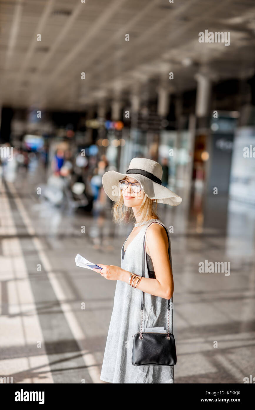 Woman at the airport Stock Photo - Alamy