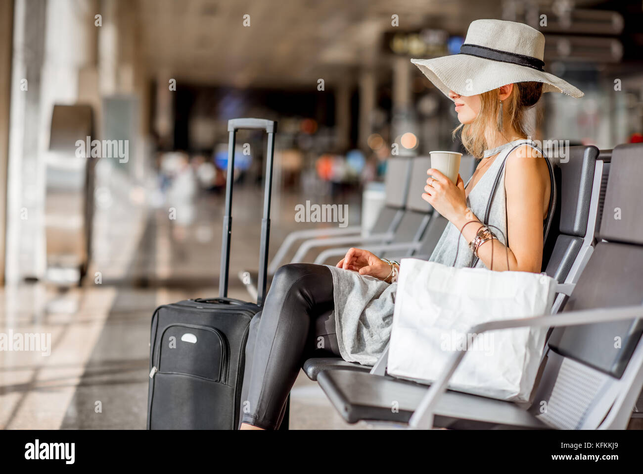 Woman at the airport Stock Photo - Alamy