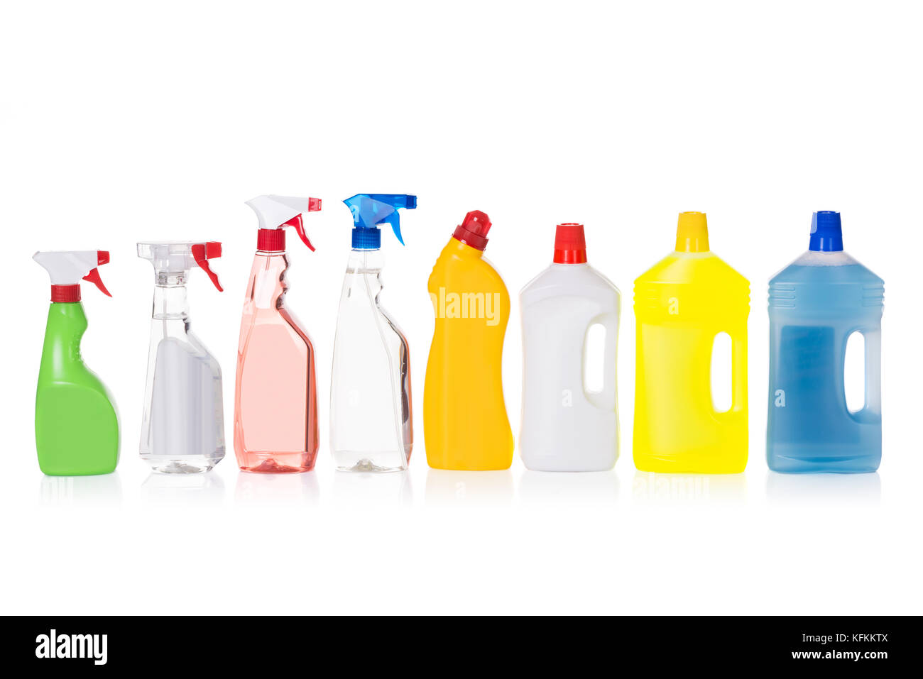 Cleaning liquid bottles in row. Isolated on white Stock Photo