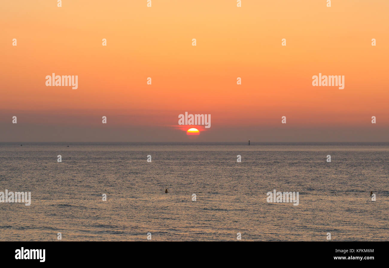 Scenic view of beautiful sunset above the sea Stock Photo - Alamy