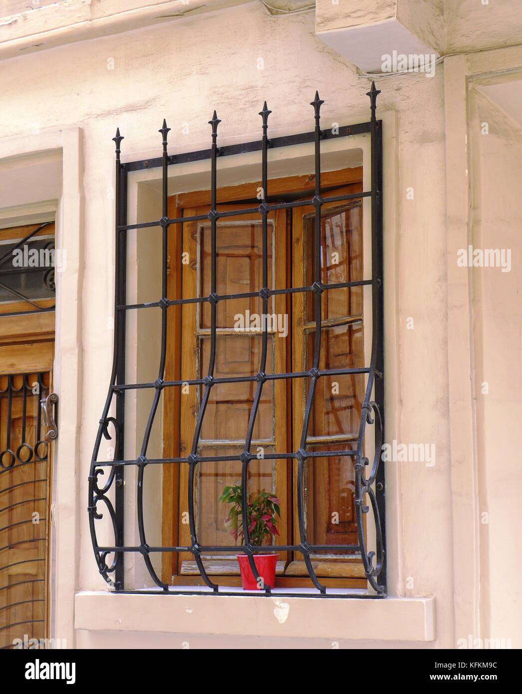 Traditional Maltese wooden doors and windows. Iron railings 17th to 20th century. Stock Photo