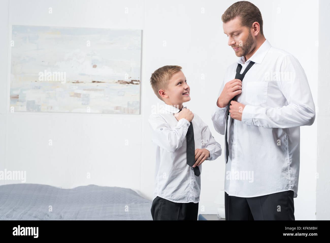 father and son in formal wear Stock Photo Alamy