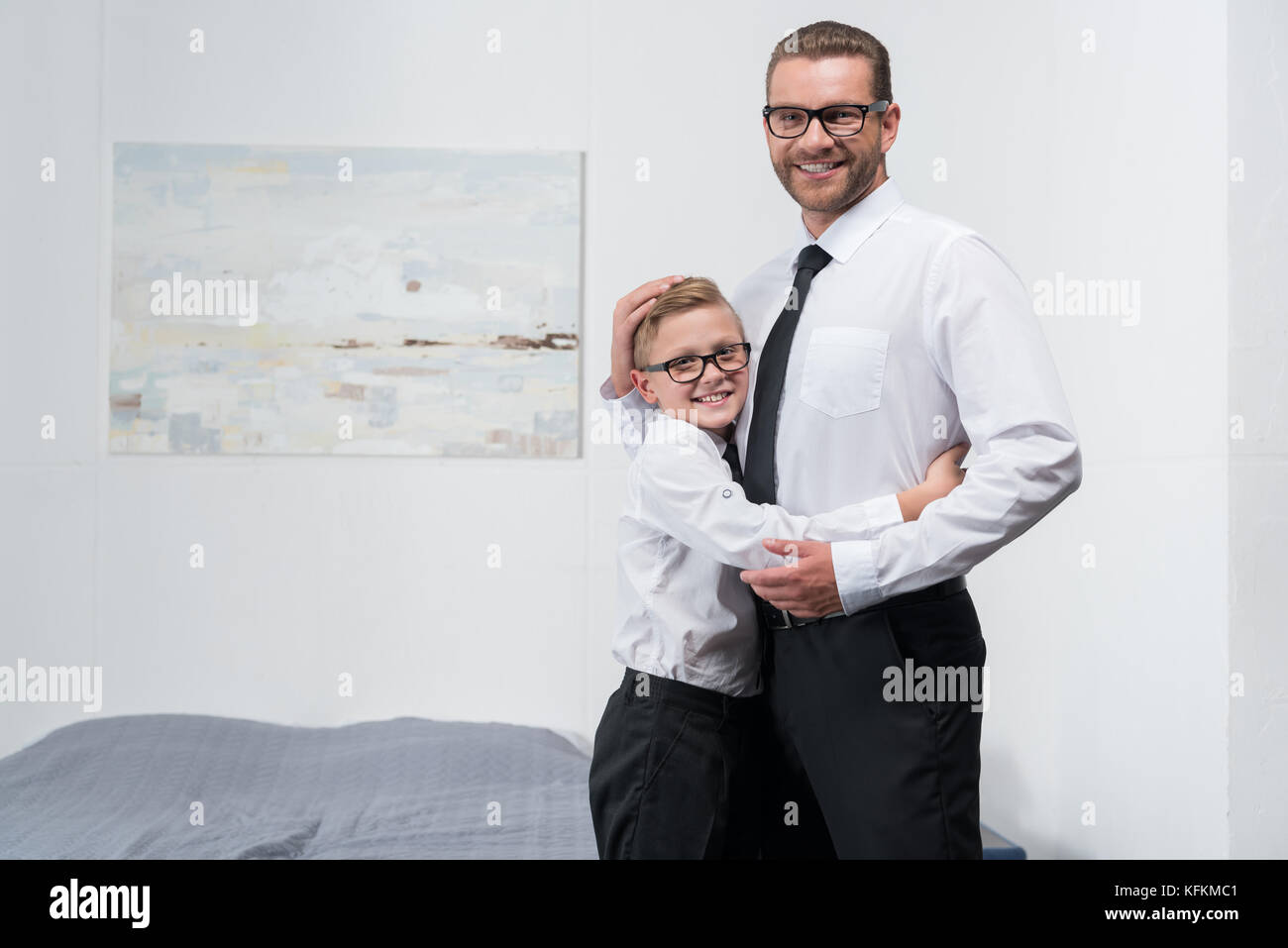 father and son in formal wear Stock Photo Alamy