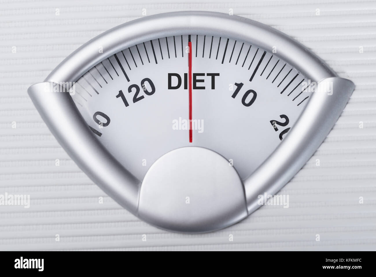 Closeup of weight scale indicating Diet word Stock Photo