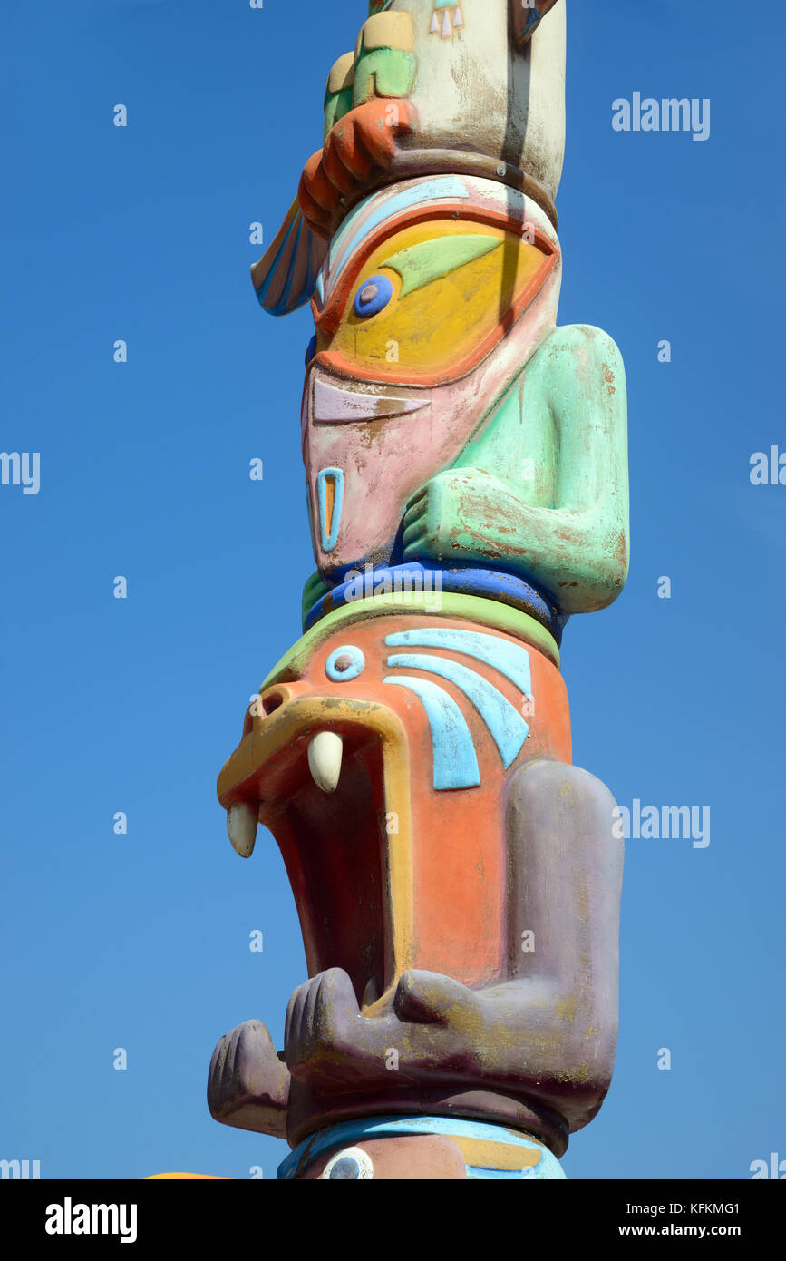 Totem Pole outside the Wild West Themed OK Corral Amusement Park, or Theme Park, Cuges-les-Pins, Provence, France Stock Photo