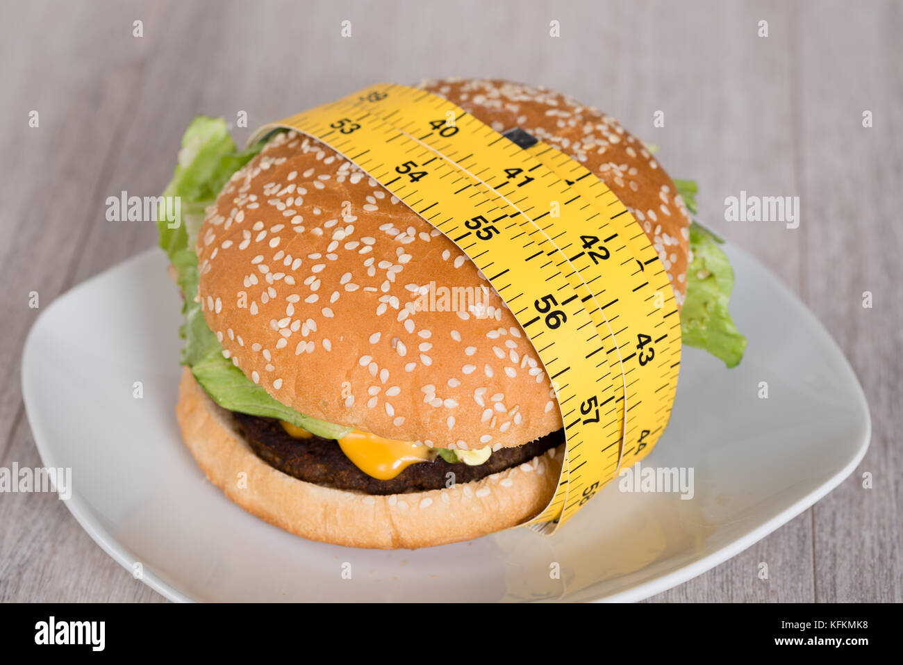 Hamburger with measuring tape hi-res stock photography and images - Alamy