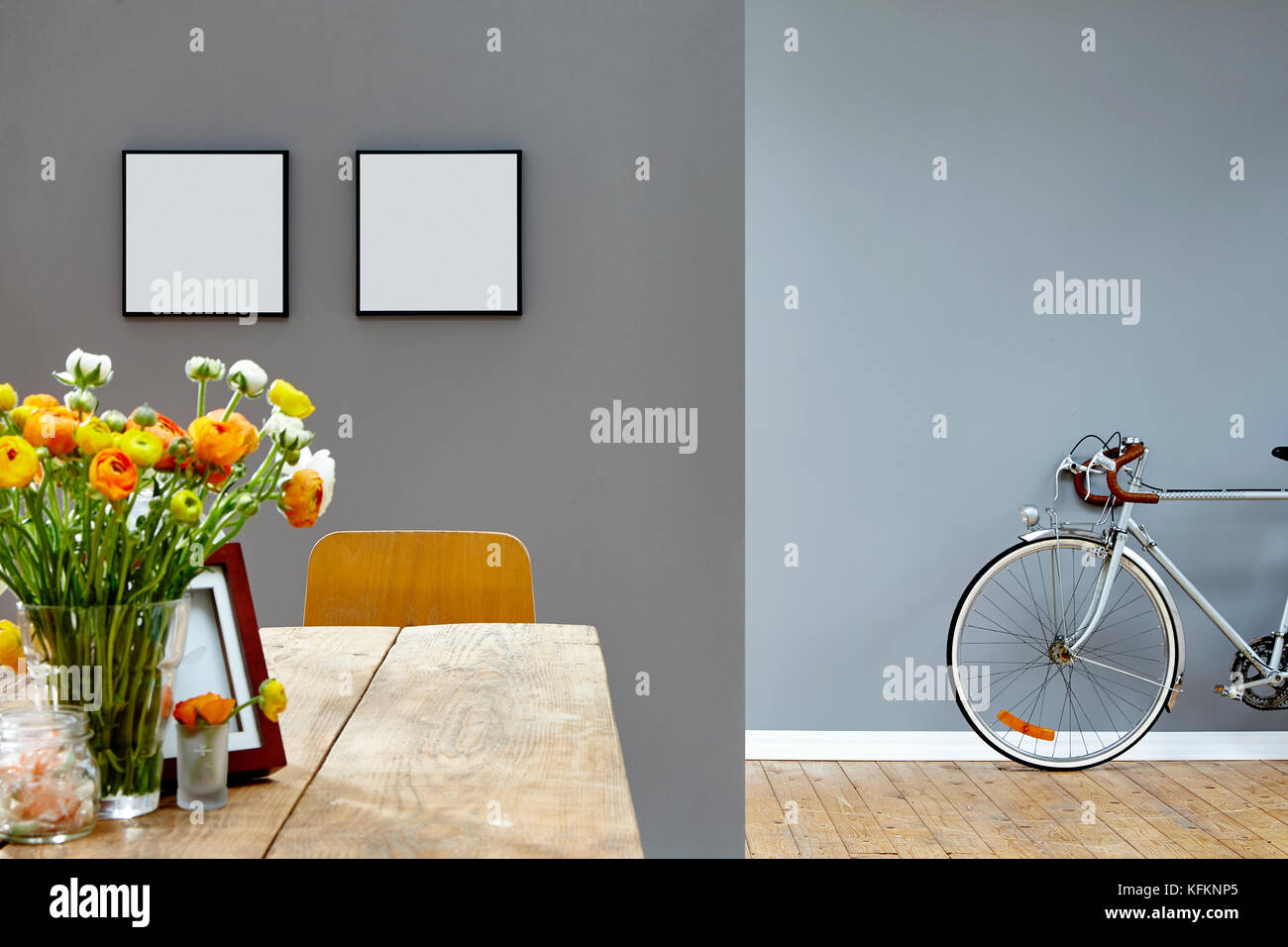 vivid wooden dining table and old bike in background Stock Photo