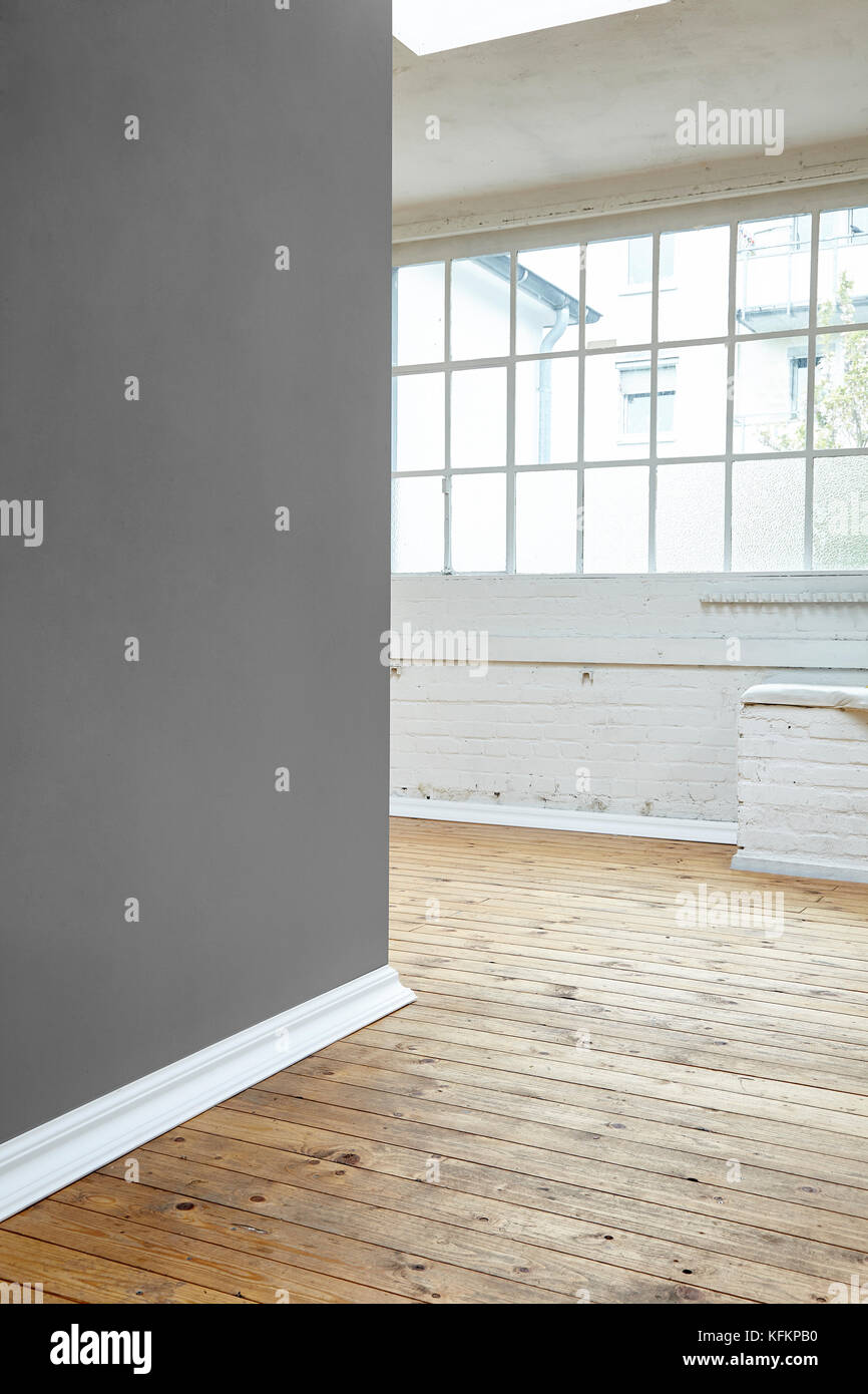 empty studio wooden floor and white brick wall Stock Photo