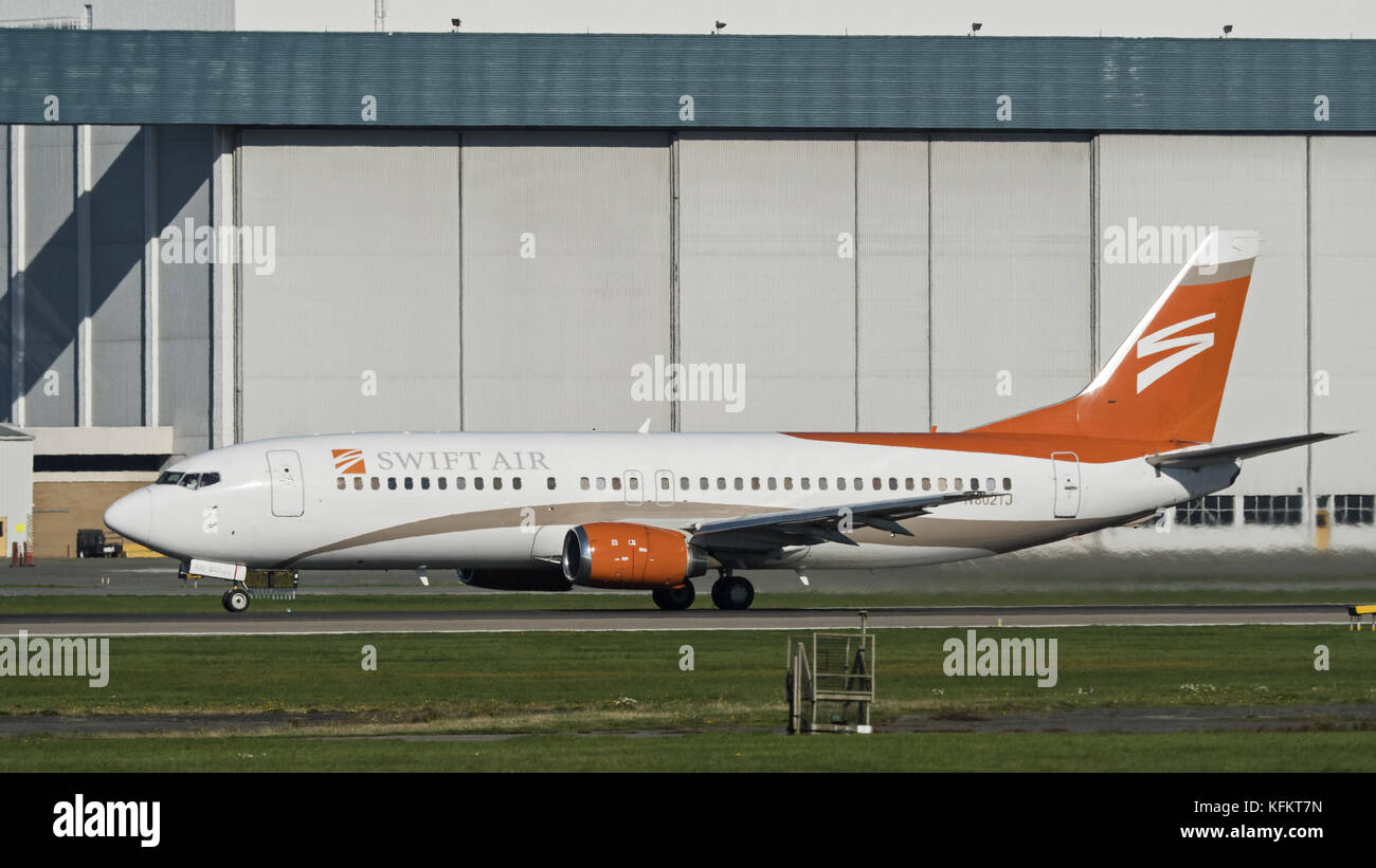Richmond, British Columbia, Canada. 26th Oct, 2017. A Swift Air Boeing 737-400 (N802TJ) jet takes off from Vancouver International Airport. The airline, headquartered in Phoenix, Arizona, offers VIP, charter and cargo services. Credit: Bayne Stanley/ZUMA Wire/Alamy Live News Stock Photo