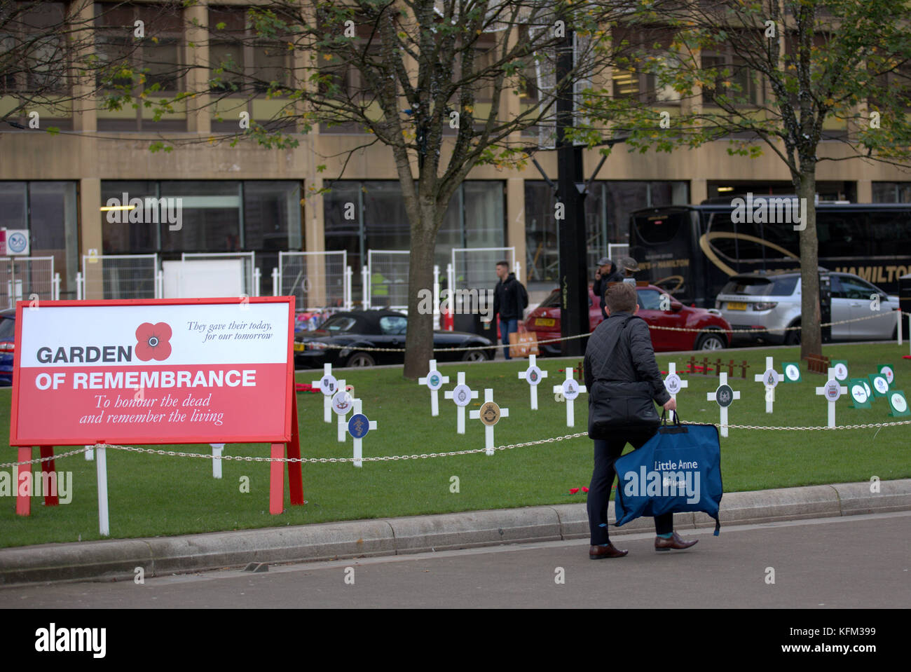 Glasgow, Scotland, UK 30h October. The Remembrance Garden in George Square was visited by piper Danny Haggerty ahead of  its inauguration ceremony tomorrow  and as the city begins its path towards remembrance Sunday there is  a poppy appeal pop up shop on Buchanan street. Credit Gerard Ferry/Alamy news Stock Photo