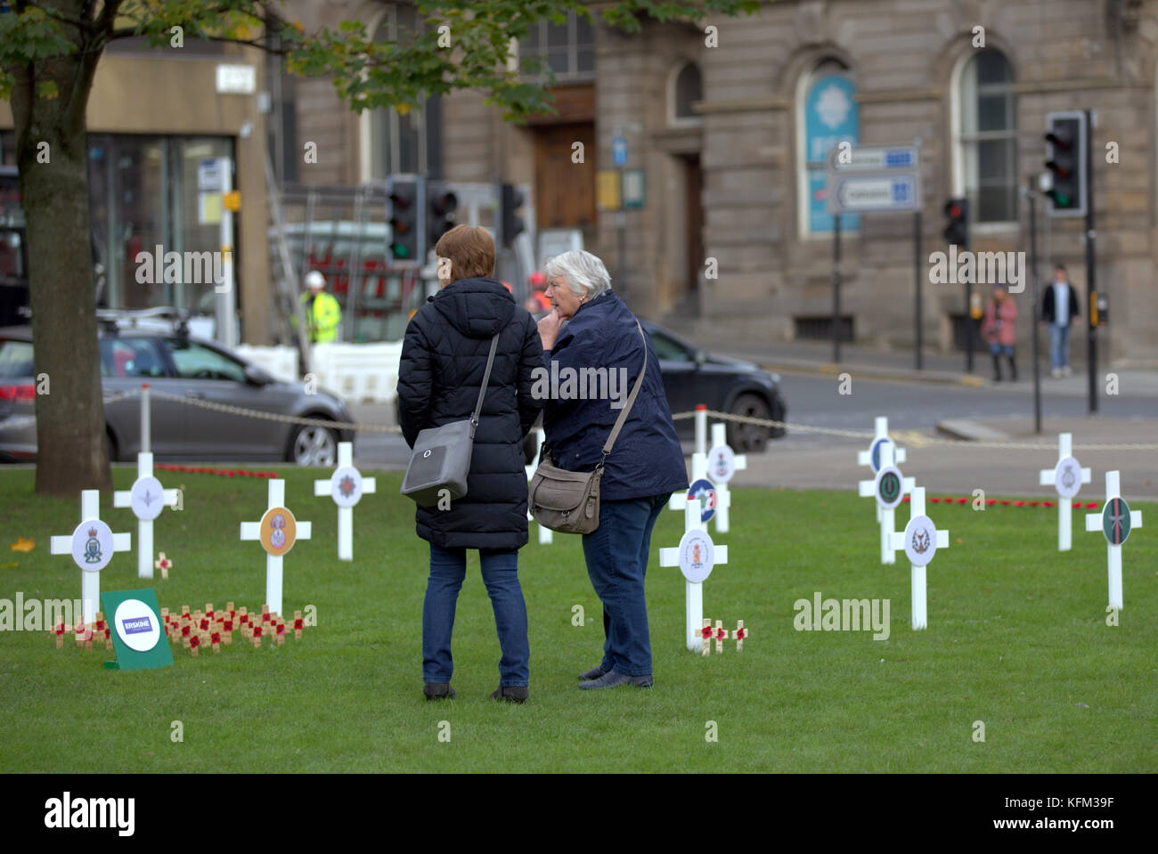 Glasgow, Scotland, UK 30h October. The Remembrance Garden in George Square was visited by piper Danny Haggerty ahead of  its inauguration ceremony tomorrow  and as the city begins its path towards remembrance Sunday there is  a poppy appeal pop up shop on Buchanan street. Credit Gerard Ferry/Alamy news Stock Photo