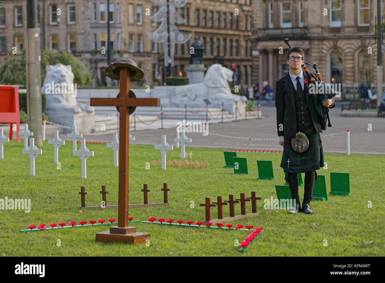 Glasgow, Scotland, UK. 30th Oct, 2017. The Remembrance Garden in George Square was visited by piper Danny Haggerty ahead of its inauguration ceremony tomorrow and as the city begins its path towards remembrance Sunday there is a poppy appeal pop up shop on Buchanan street. Credit: gerard ferry/Alamy Live News Stock Photo