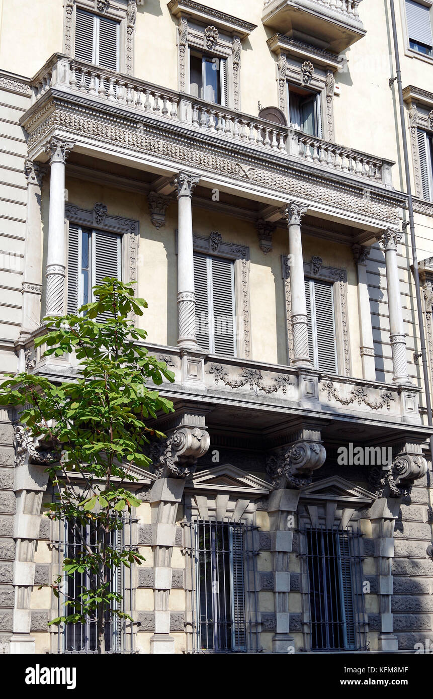 Massive stone first floor stone loggia, bracketed off grand apartment building Stock Photo