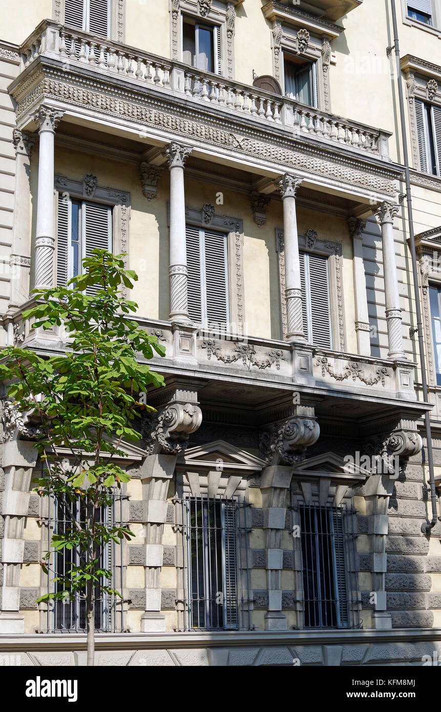 Massive stone first floor stone loggia, bracketed off grand apartment building Stock Photo