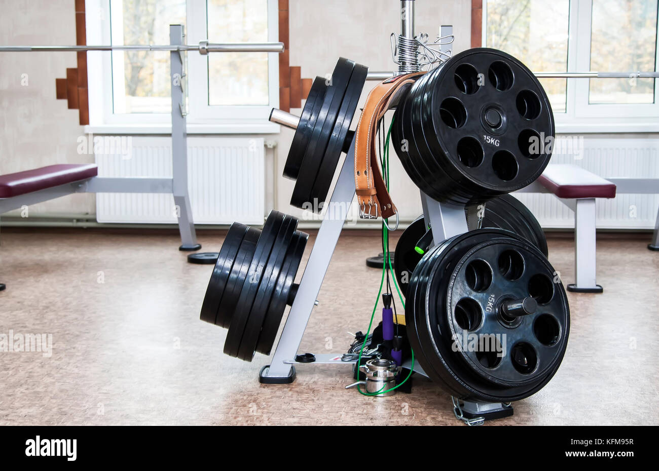 Disassembled barbell on floor in gym.Sports equipment Stock Photo - Alamy