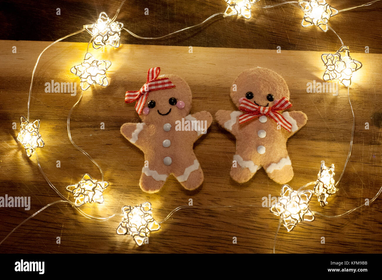 christmas gingerbread men decorations surrounded by fairy lights - Christmas Gingerbread Men Decorations christmas gingerbread men decorations surrounded by fairy lights - Christmas Gingerbread Men Decorations