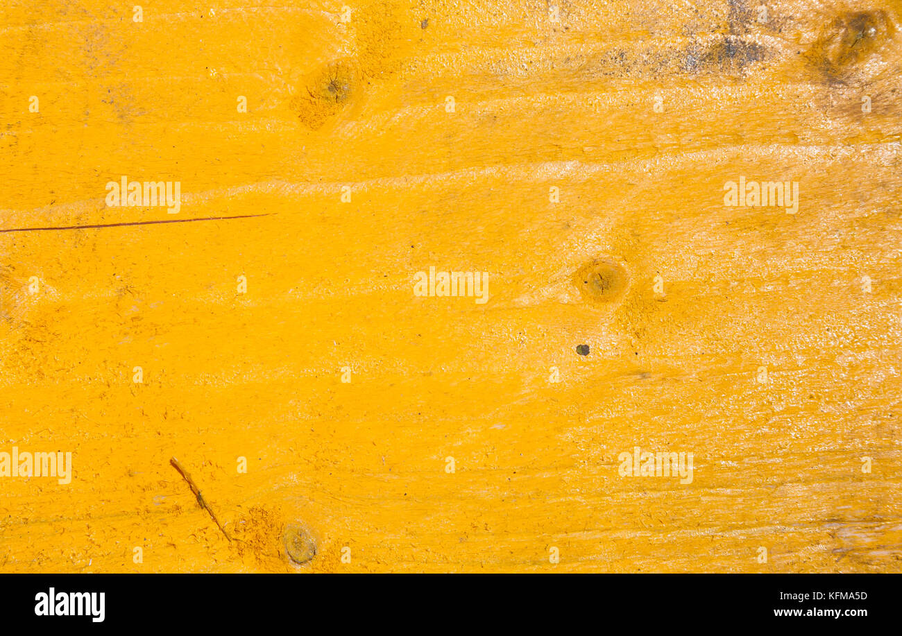 background image of textured yellow painted wood Stock Photo