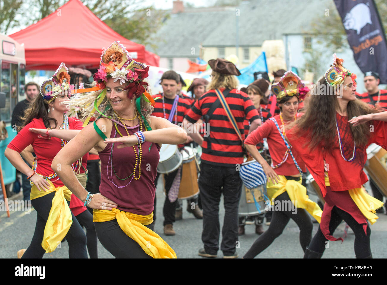 Penryn Kemeneth a two day heritage festival at Penryn Cornwall - Samba dancers of DakaDoum Samba Band dancing through the streets of Penryn. Stock Photo