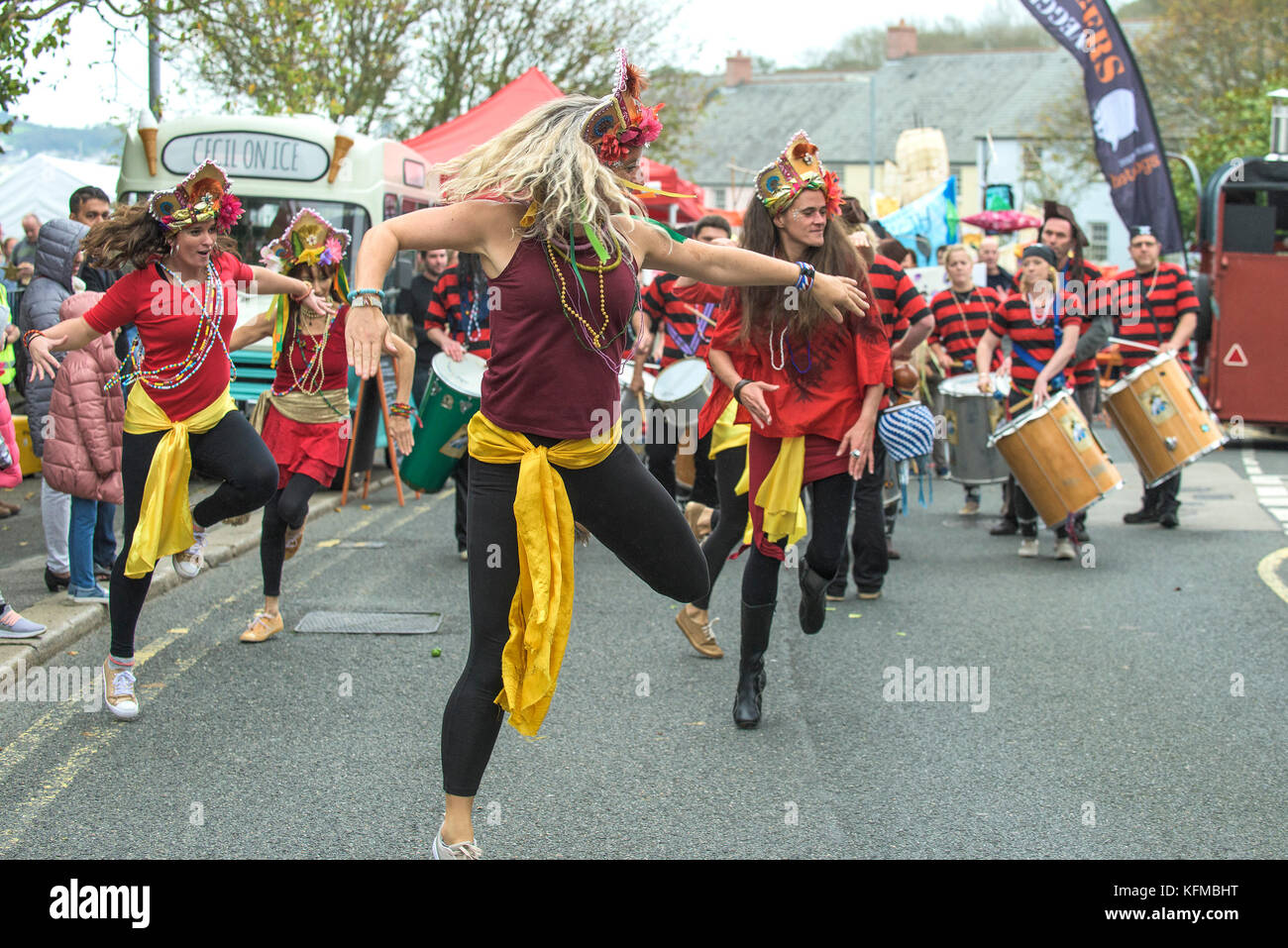 Penryn Kemeneth a two day heritage festival at Penryn Cornwall - DakaDoum Samba Band and dancers performing through the streets of Penryn. Stock Photo