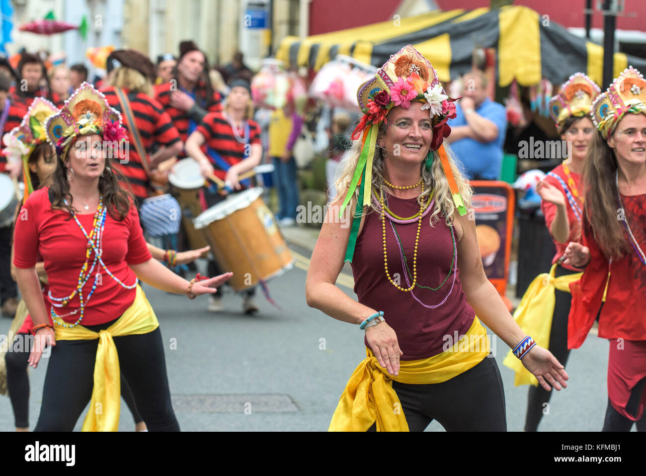 Penryn Kemeneth a two day heritage festival at Penryn Cornwall - Samba dancers of DakaDoum Samba Band dancing through the streets of Penryn. Stock Photo