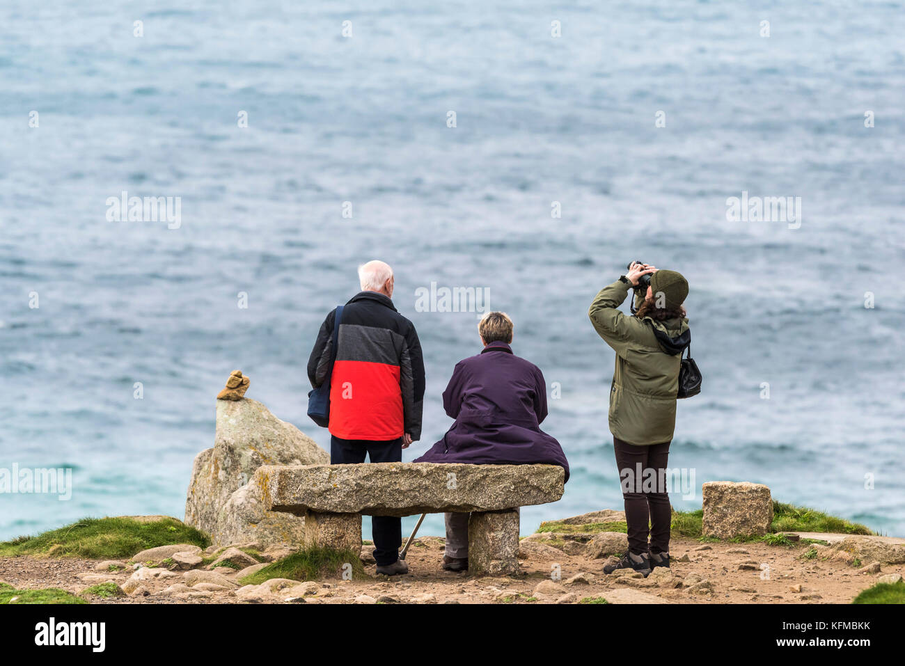 Tourists visiting Porth Nanven in Cornwall. Stock Photo