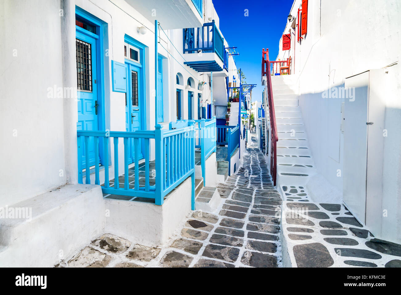 Mykonos, Greece. Whitewashed dotted alley in old city, Cyclades Greek Islands. Stock Photo