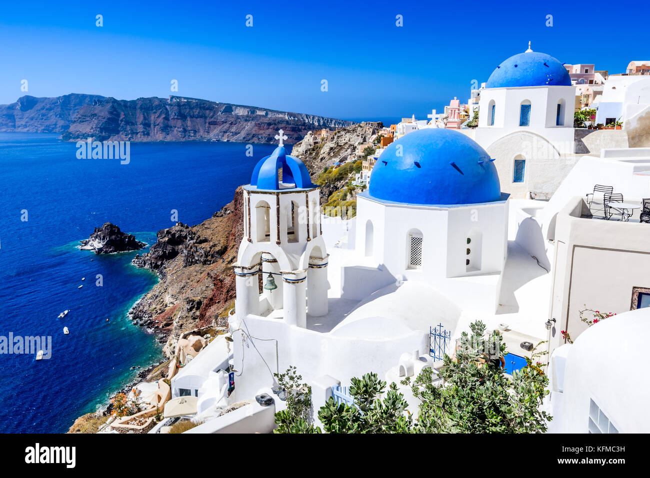 Oia, Santorini, Greece. Famous attraction of white village with cobbled streets, Greek Cyclades Islands, Aegean Sea. Stock Photo